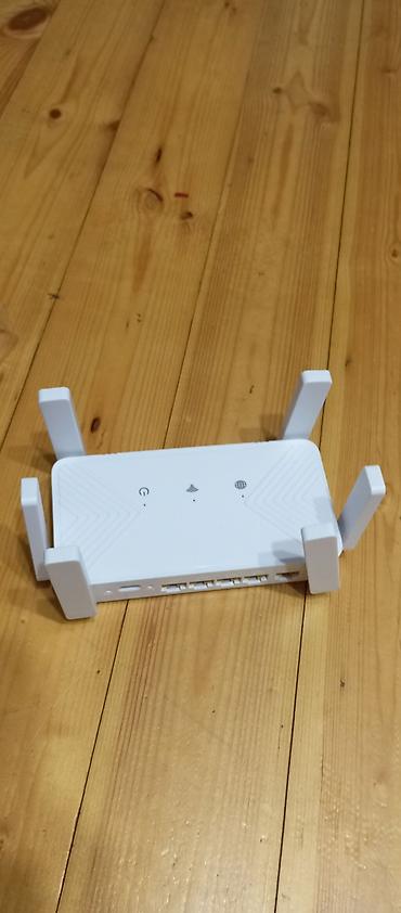 azercell modem satilir: Wifi ruter, ruter. 4 çıxışlı, yeni, qutuda. Kompakt ölçüdə. Ölçüləri — 4