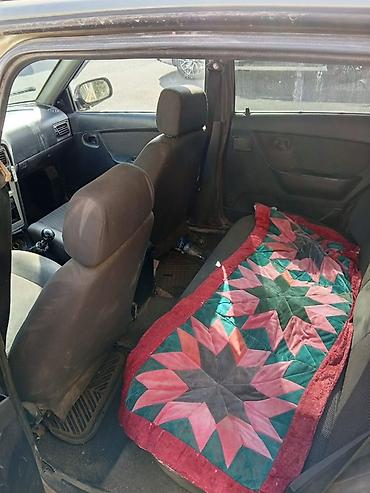 Daewoo Nexia: 2011 г., Механика, Седан
