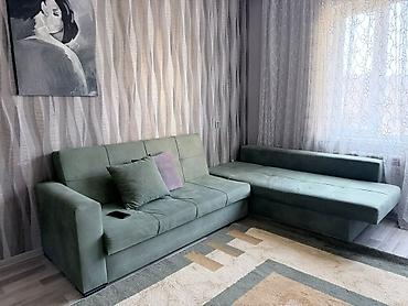 Kunc divan satilir Qiymet 190 man. Bazasi var.Her 2teref acilir Divan
