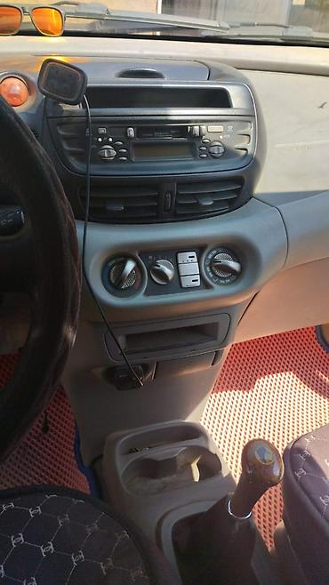 мини электро: Nissan Almera Tino: 2002 г., 1.8 л, Механика, Бензин, Хэтчбэк — 5