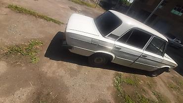 VAZ (LADA): VAZ 2106, ağ rəngli sedan. Texniki xüsusiyyətlər: - Kuzov: sedan — 11