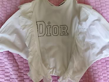 dior canta: Ağ rəngli qız uşağı köynəyi/bluz. Ön hissədə “Dior” yazısı daşlarla — 1