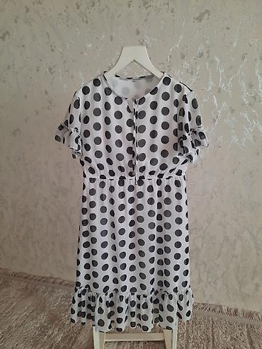 Futbolka və maykalar: Məhsul: 2 ədəd qadın bluz/don üstü 1) Kobalt mavi, güllü naxışlı — 7