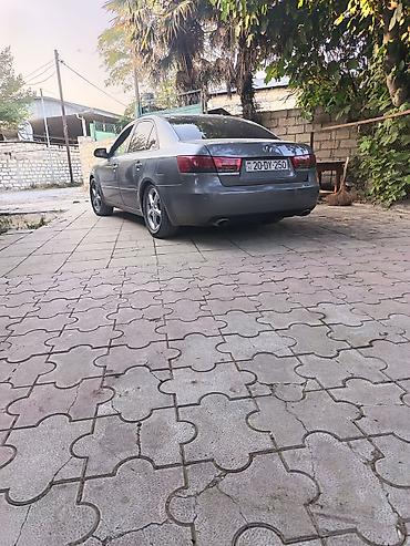 maşın 09: Hyundai Sonata: 3.3 l | 2005 il Sedan — 3