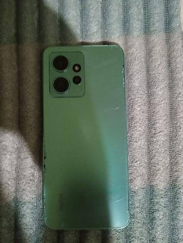 any unboxing endir: Redmi smartfon – yaşıl rəngli korpus, iki böyük kamera modulu və LED — 1