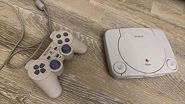 playstatio: Komplekte ps1 slim adapteri AV kabeli ve pultu daxildir. Qeyd edimki — 1