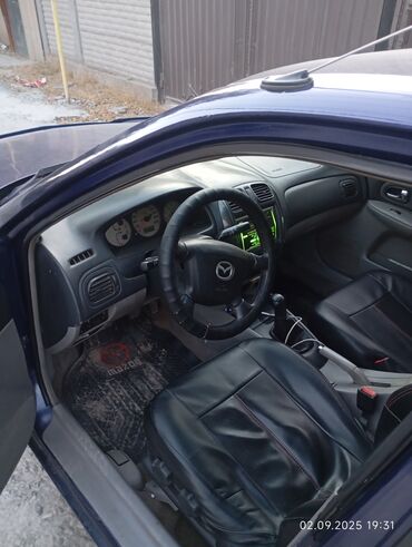 мазда продажа: Mazda 323: 2002 г., 1.6 л, Механика, Бензин, Седан