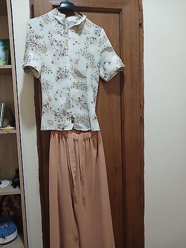 Bej rəngli qadın kulot şalvar - Model: geniş kəsimli, culotte stil - lalafo.az -da Bej rəngli qadın kulot şalvar - Model: geniş kəsimli, culotte stil -
