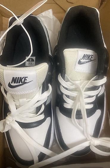 air force 1 black: Кроссовки Nike, модель в классической чёрно‑белой расцветке — 2