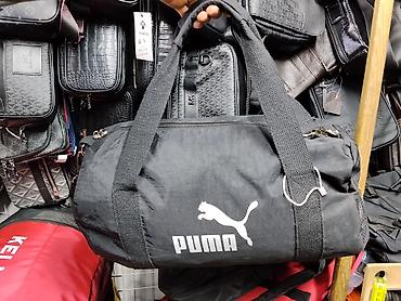 авто спальник: Спортивная сумка-баул PUMA, черная - Форм-фактор: цилиндрическая — 1