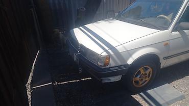 saab 93: Mazda 323: 1989 г., 1.6 л, Механика, Бензин, Седан — 1