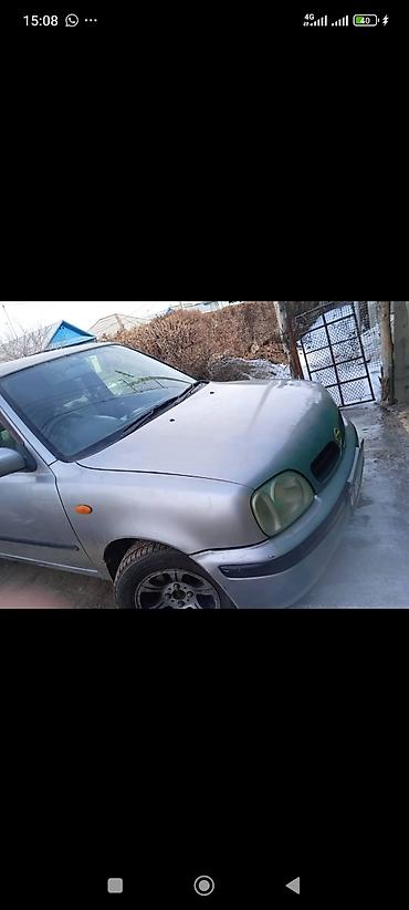 Унаа: Nissan Март: 2001 г., 1 л, Автомат, Бензин — 2