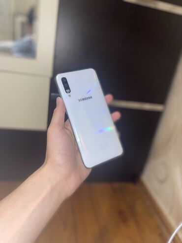 54 ekran tv: Samsung Galaxy A30, 32 GB, rəng - Ağ, Sensor, Barmaq izi, İki sim kartlı
