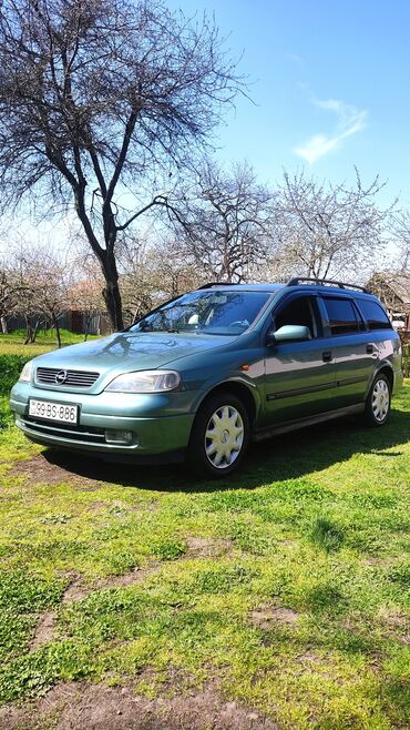 kia picanto satilir: Opel Astra: 1.8 l | 1998 il | 404040 km Universal