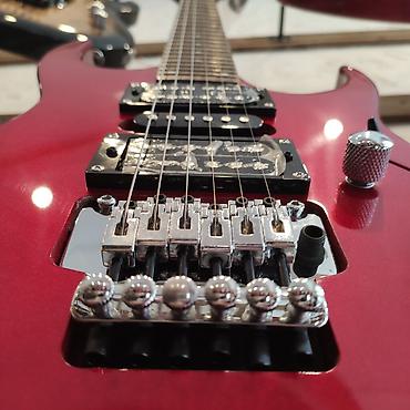 gitara tarnada: Elektro-gitara Smiger S-G5 Simlərin sayı: 6 Üst: Cökə ağacı Qol — 2