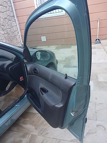 maqnitola az: Peugeot 206: 1.4 l | 2003 il 342000 km Hetçbek — 4