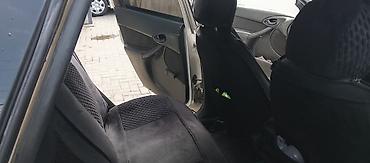 highlander platinum: Ford Focus I, 5‑дверный хэтчбек, серебристый цвет. Особенности и — 2