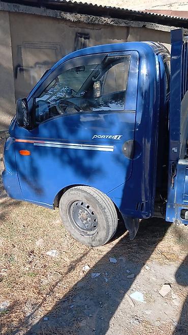 хд 72: Hyundai Porter II, синий бортовой малотоннажный грузовик. Особенности — 2
