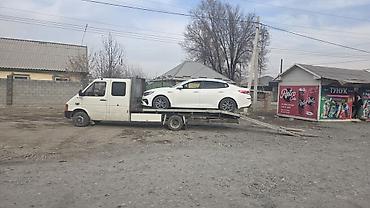 Услуги эвакуатора: С прямой платформой — 10