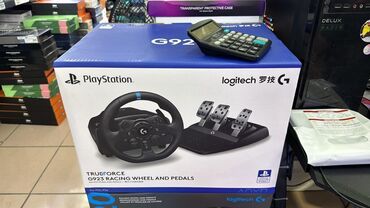 Настольные игры: Игровой руль Logitech G923 или G29, который используется для