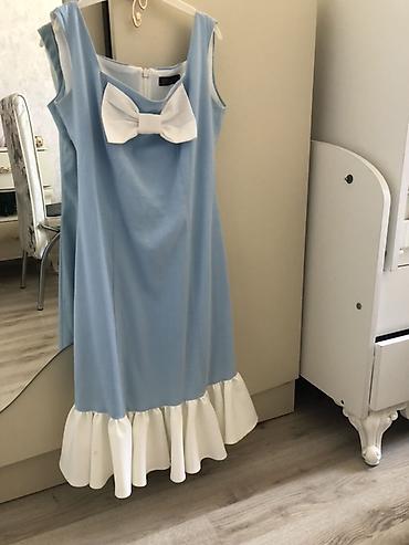 ağ don: Mavi rəngdə, ağ detallarla bəzədilmiş qadın donu. - Model: qolsuz, düz — 1