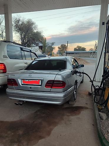 audi a4: Mercedes-Benz E-Class: 1997 г., 4.3 л — 5