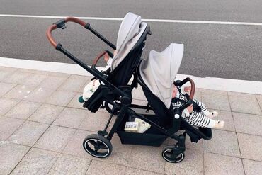 детские коляски для близнецов: Коляска, цвет - Серебристый, Б/у