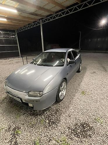 Унаа сатуу: Mazda Lantis: 1996 г., 1.6 л, Кол менен иштөөчү, Бензин, Седан — 3