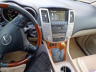 Другие детали салона: Lexus RX 330) — интерьер и оснащение - Рулевое колесо с — 1