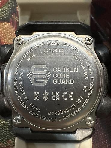Aksesuarlar: Casio G-Shock GA-B001 seriyalı qol saatı. Ağ korpus və qayışa, qara — 2