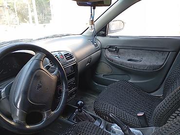 Daewoo: Daewoo Nubira sedan - Kuzov: 4 qapılı sedan, ağ rəng - Ban dizaynı — 15