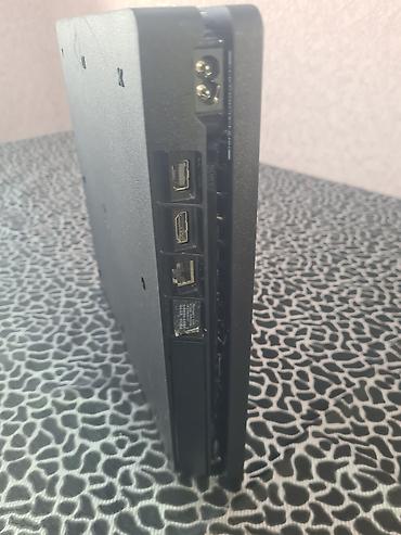 PS4 (Sony Playstation 4): PlayStation 4 Slim konsolu dəsti Xüsusiyyətlər: - Model: PS4 Slim — 9