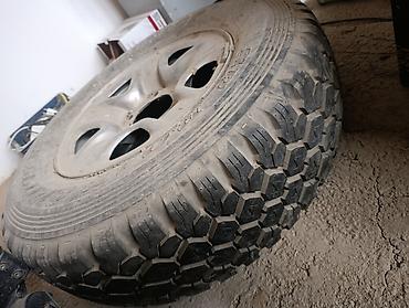 d 110: Колесо в сборе: шина + литой диск. - Шина: Dunlop SP Road Gripper - — 1