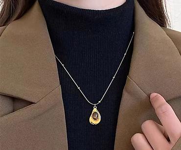 Bijuteriya: Minimalist boyunbağı – üzvi formalı kulon - Rəng: qızılı - Stil — 1