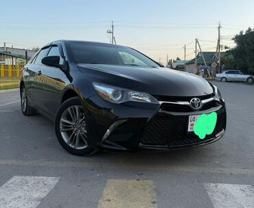 панель торпедо камри 30: Автомобиль Toyota Camry черного цвета. Седан оснащен автоматической