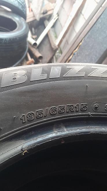 щетка для машины от снега: Зимние шины Bridgestone Blizzak - Размеры: 215/60 R16 99H XL и 195/65 — 3