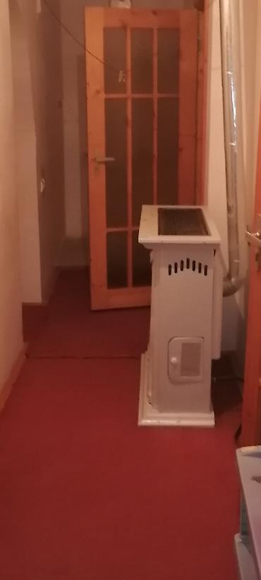 asma tavan hamam: Qaz sobası və dekorativ kamin önlüklü istilik sistemi - Yanacaq — 1