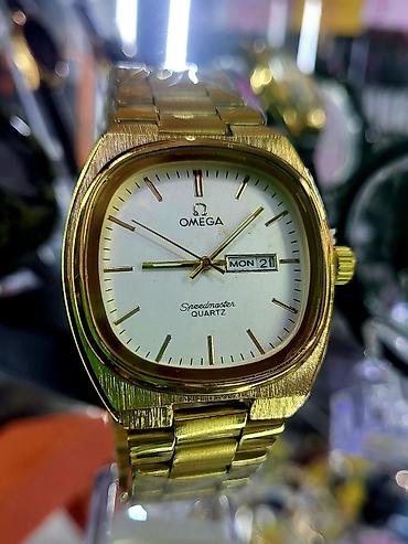 saat omega: Yeni, Qol saatı, Omega, rəng - Qızılı — 1