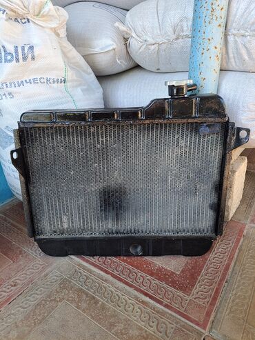 radiator qapağı: Radiator vaz 2106 misdi ama iranındı 1-yerdən xırda lap azca sızması