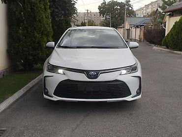 Toyota Corolla: 2021 г., 1.8 л, Вариатор, Гибрид, Седан