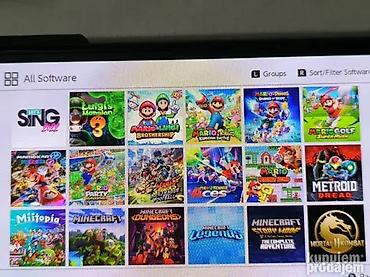 Nintendo Switch: Nintendo Switch OLED konzola cipovana 64gb + 512gb microSD sa 140 — 6