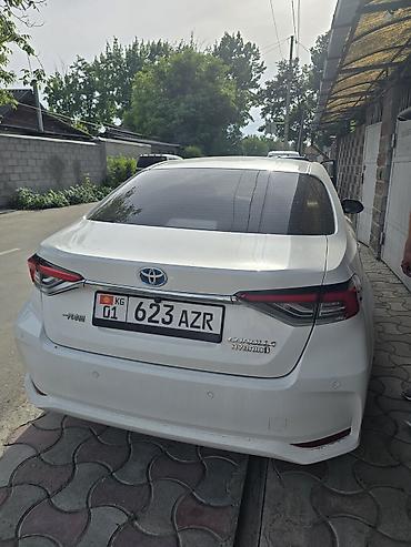 corolla 2022: Toyota Corolla: 2022 г., 1.8 л, Вариатор, Гибрид, Седан — 4