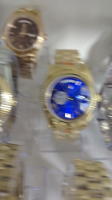 kisi sepi: Rolex Oyster Perpetual Day‑Date kolleksiyasından kişi qol saatları — 8