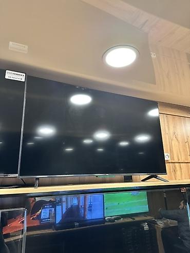Телевизор TCL, диагональ ориентировочно 55–65". Особенности и