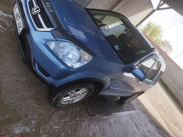 Honda: Honda CR-V 2 кузов синего цвета. Этот компактный кроссовер отличается