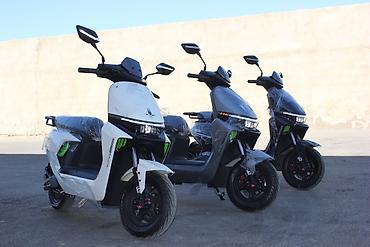 mopet elektrik: Elektrik skuter – şəhərdaxili sürət və komfort üçün müasir model - — 2