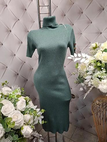 Haljine: Rebrasta pletena haljina sa poludolčevitom - Kroj: uska, midi dužina — 10