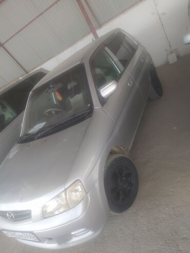 купить мотоцикл из китая бу: Mazda Demio: 2001 г., 1.3 л, Автомат, Бензин, Седан