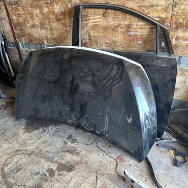 Другие детали кузова: Кузовные детали для KIA Carnival (Sedona) В наличии: - Капот (черный) — 2