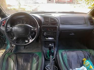ford transit 2003: Mazda 323: 1995 г., 1.8 л, Механика, Бензин, Хэтчбэк — 7
